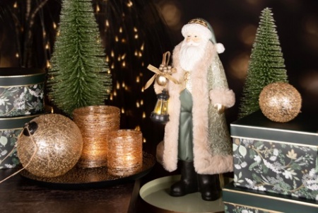 Père Noël avec une lanterne en vert avec des leds